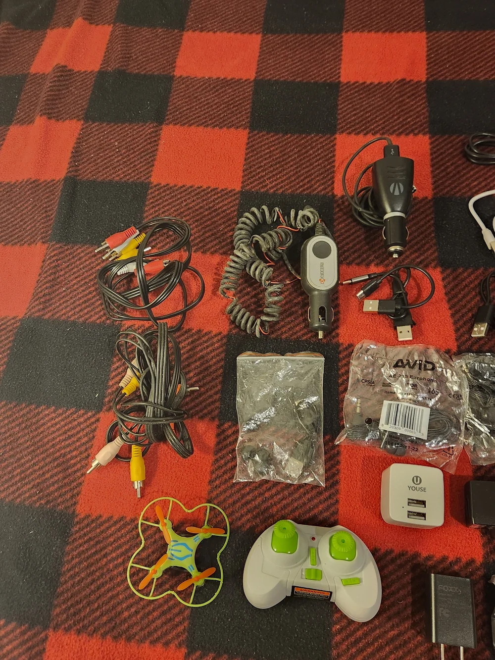 Elctronics Lot, Cellphones, Charging Cords, Remotes, And More